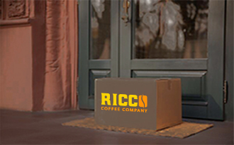 Ricco Coffee Delivered Fresh to Your Doorstep – Free Shipping on All Subscriptions Ricco Coffee delivery box placed at a customer’s doorstep, symbolizing free home delivery with subscription