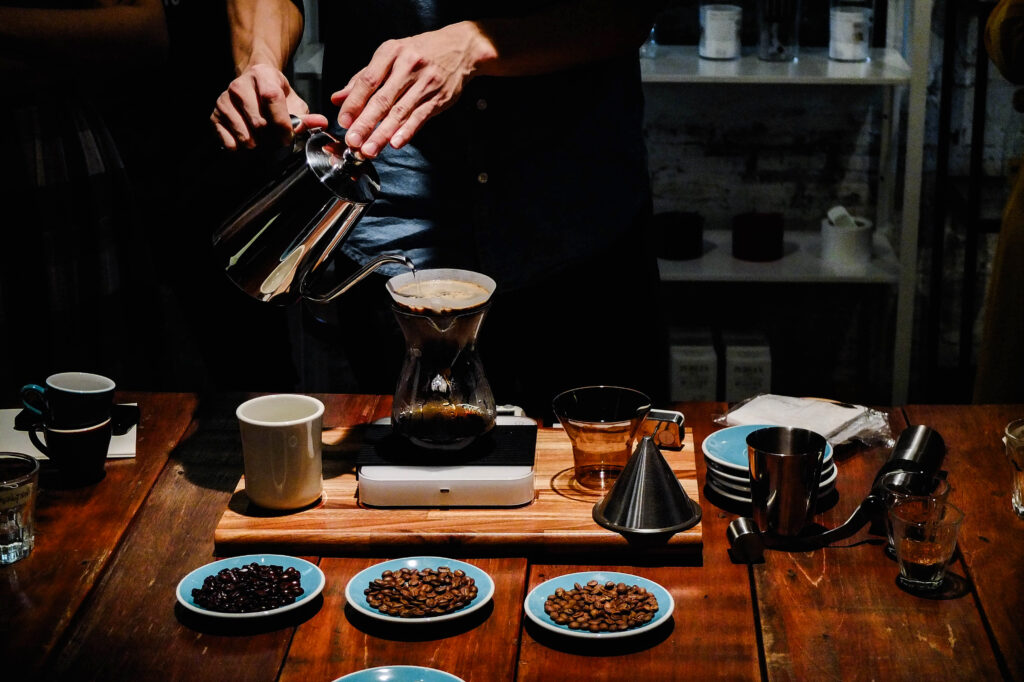 Hand Drip Coffee - Barista Pouring Water Over The Coffee